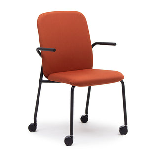 Bejot Hens chair with orange upholstery and armrests on castors