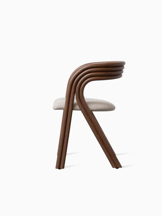 Vincent Sheppard Arc Dining Chair in tabaksgebeitst rotan, zijaanzicht