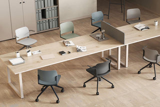 Lifestyle image of Bejot Volo swivel chairs at bench workstations, top view