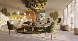 Sfeerbeeld van een BLOOM akoestische boom boven een lounge in een open kantoor