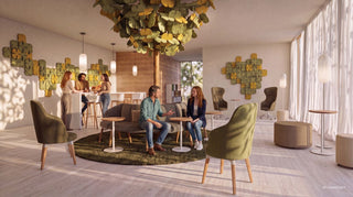 Sfeerbeeld van een BLOOM akoestische boom boven een lounge met groene fauteuils en mensen