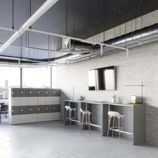Lifestyle image of Buronomic Locker Eko 12-compartment code lock lockers in white and Cèdre in a loft