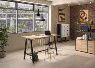 Lifestyle image of a Buronomic Locker Eko nine-compartment locker on metal base in an industrial office