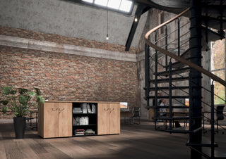 Lifestyle image of low Buronomic Quietude cabinets with central column in Nebraska and black in a loft